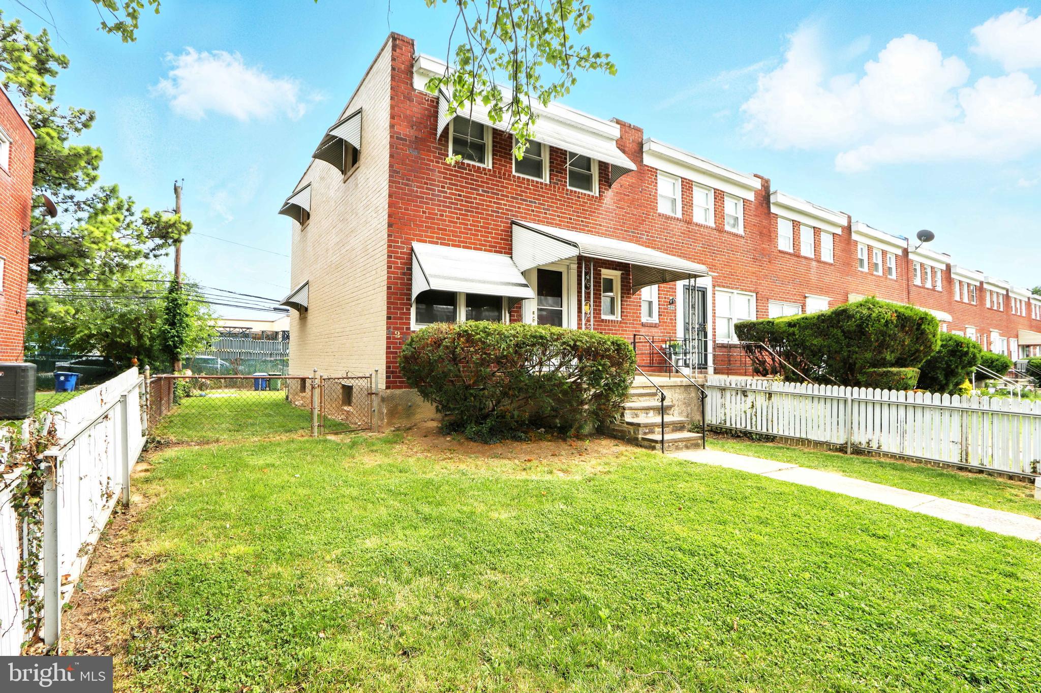 4255 Labyrinth Road Baltimore, MD 21215 - Photo 2 of 27 a view of a house with a yard and sitting area