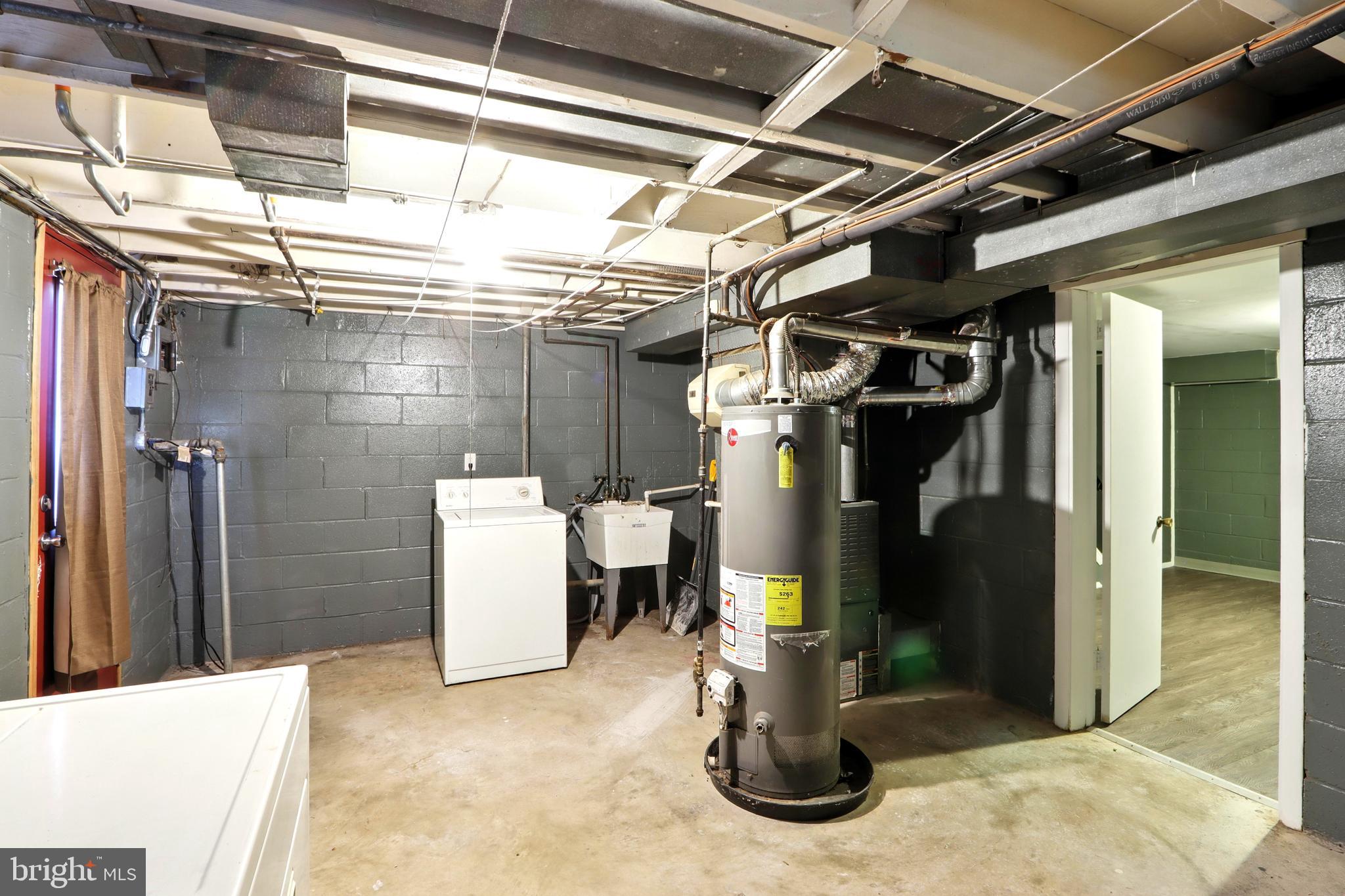 4255 Labyrinth Road Baltimore, MD 21215 - Photo 23 of 27 a view of water heater room