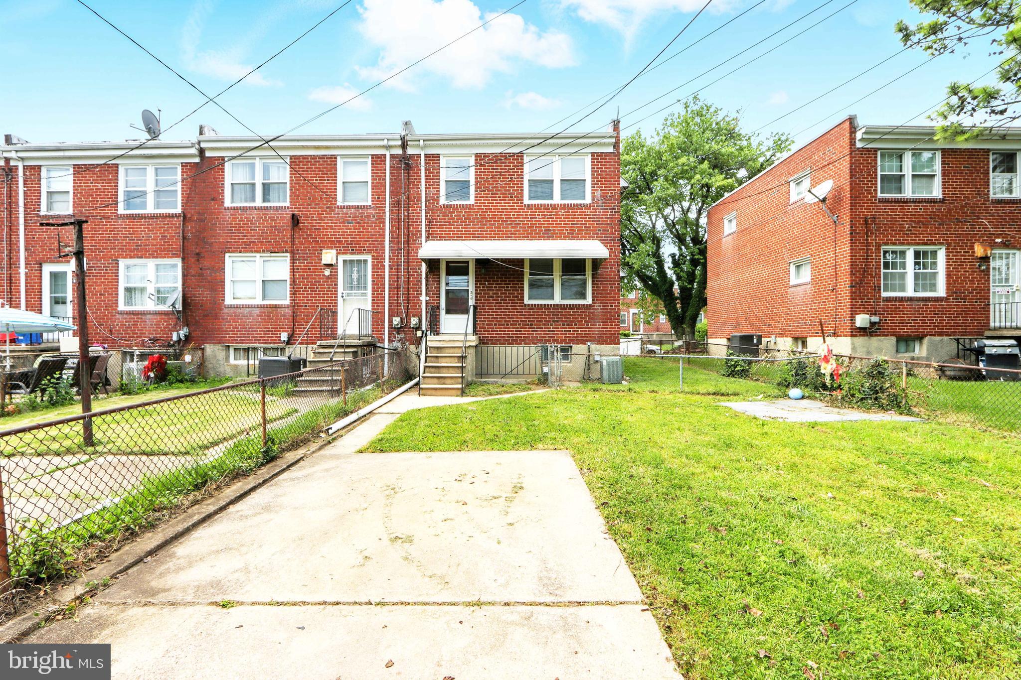 4255 Labyrinth Road Baltimore, MD 21215 - Photo 27 of 27 a view of building with yard