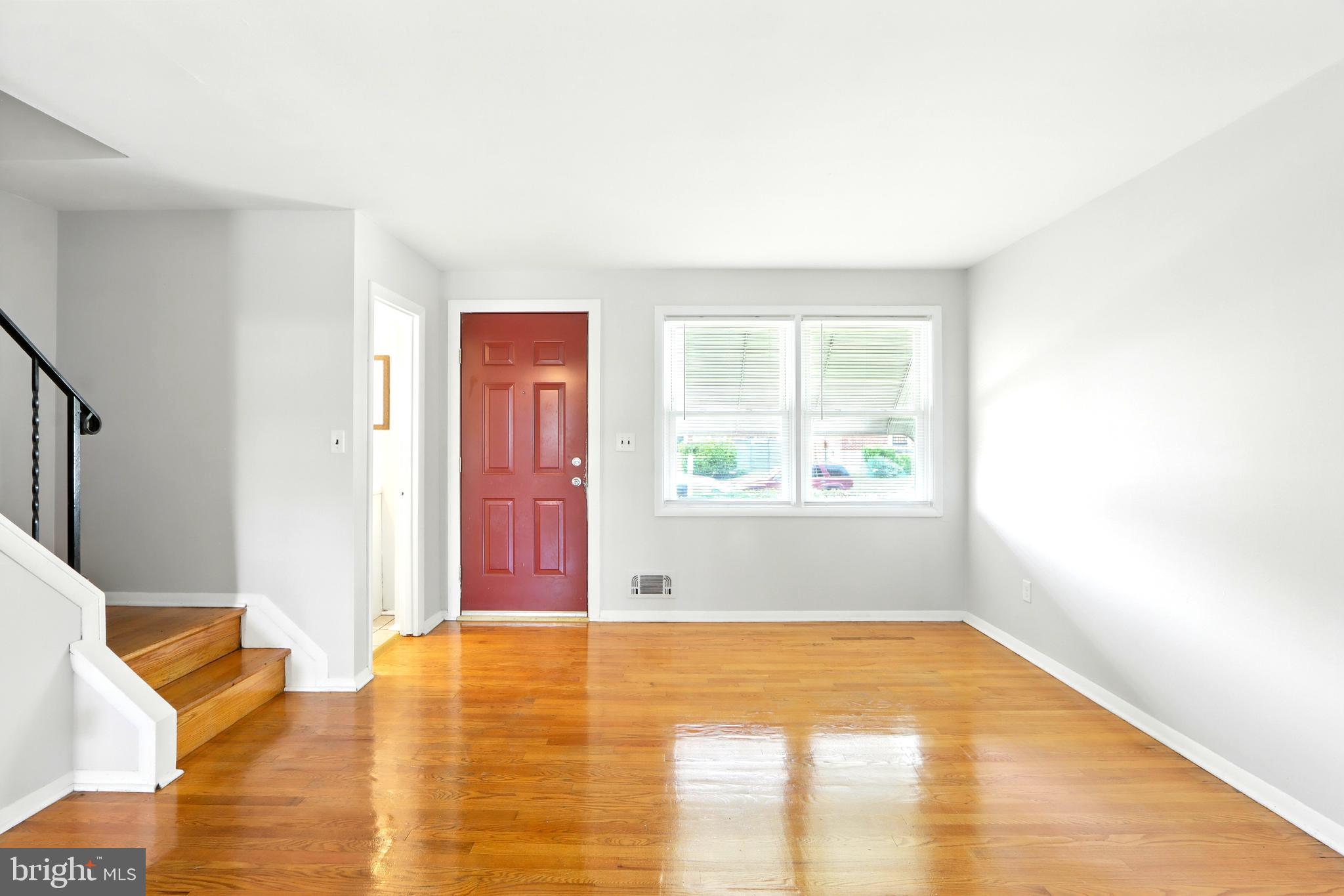 4255 Labyrinth Road Baltimore, MD 21215 - Photo 4 of 27 a view of livingroom with kitchen