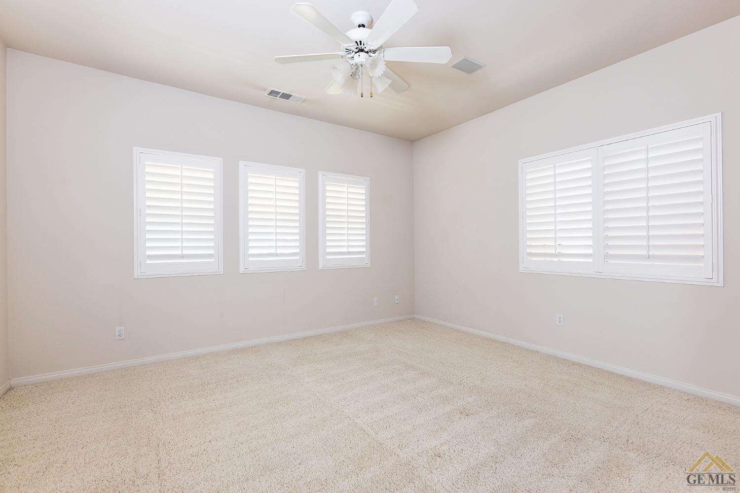 Undisclosed Address Bakersfield, CA 93311 - Photo 21 of 31 a view of an empty room with a window