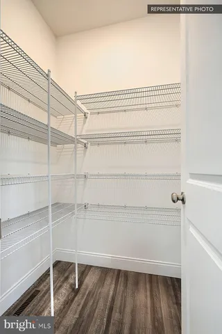 a view of a room with racks on the wall