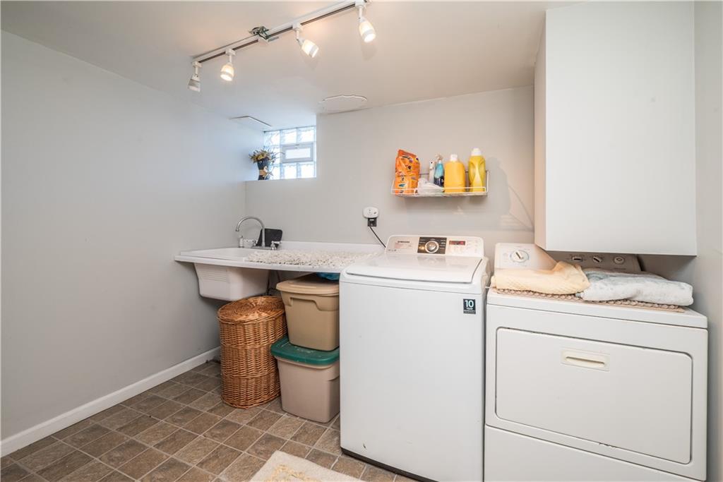 4915 Brownsville Road Pittsburgh, PA 15236 - Photo 18 of 21 a room with storage and utility