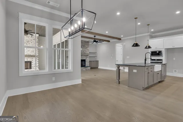 an empty room with fan