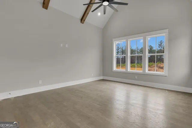 a view of an empty walk in closet