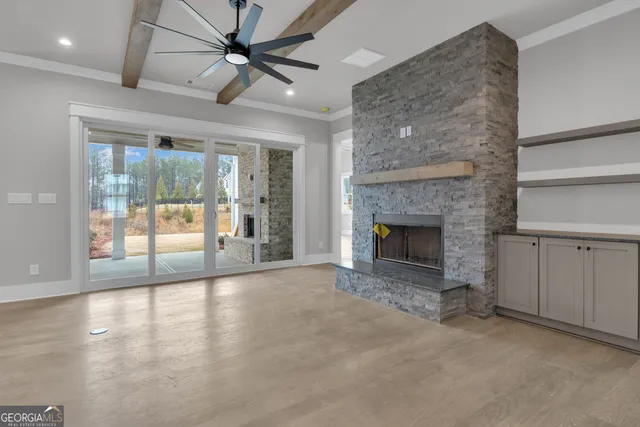 a view of a kitchen with a sink and a stove top oven