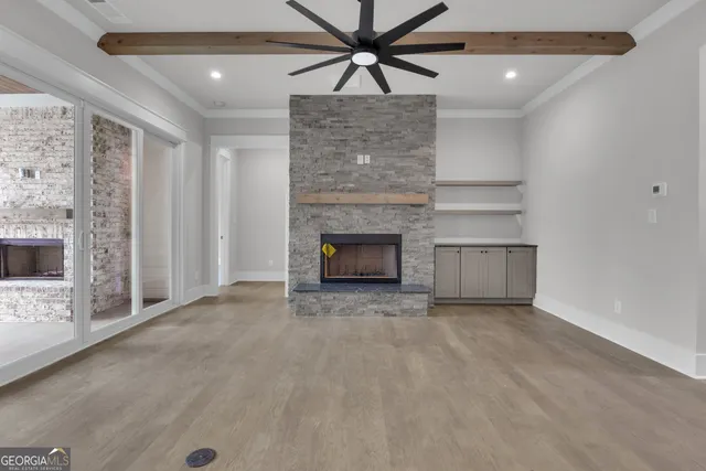 a kitchen with a sink cabinets and window