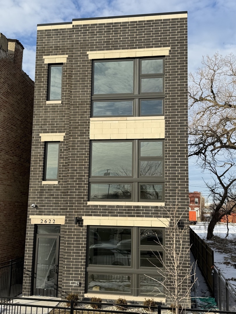 2622 West Adams Street, Unit 2 Chicago, IL 60612 - Photo 1 of 26 a front view of a house