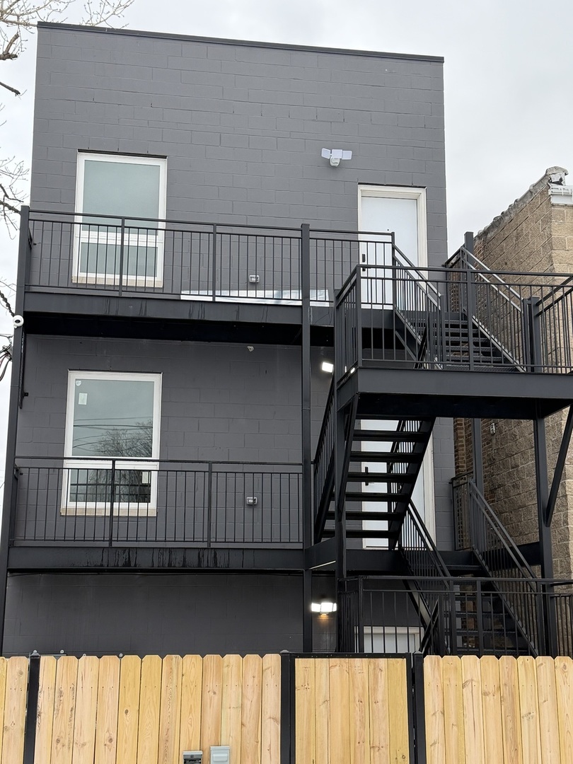 2622 West Adams Street, Unit 2 Chicago, IL 60612 - Photo 22 of 26 a view of a house with entryway and wooden floor