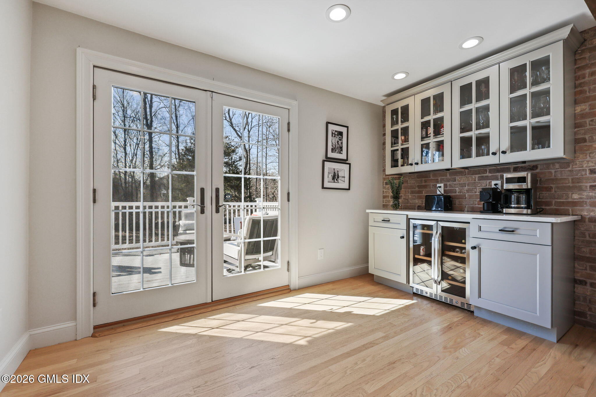 97 Davenport Ridge Lane Stamford, CT 06903 - Photo 14 of 31 a view of an empty room with a kitchen and a window