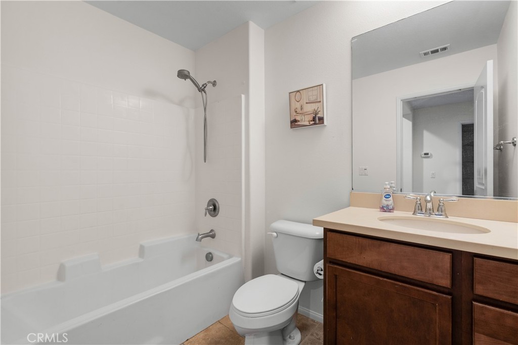 8039 City View Place Rancho Cucamonga, CA 91730 - Photo 13 of 39 a bathroom with a sink a toilet and shower