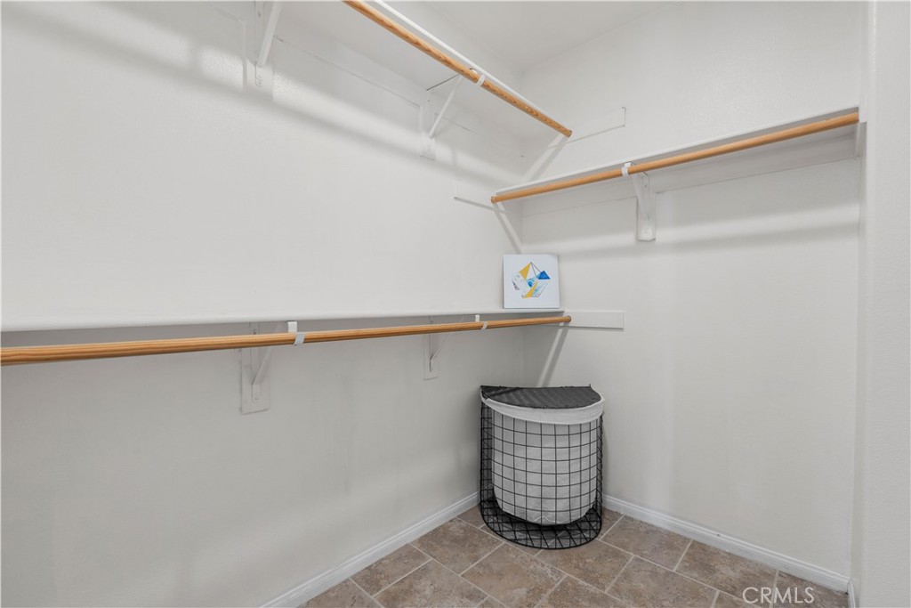 8039 City View Place Rancho Cucamonga, CA 91730 - Photo 19 of 39 a close view of racks on the wall