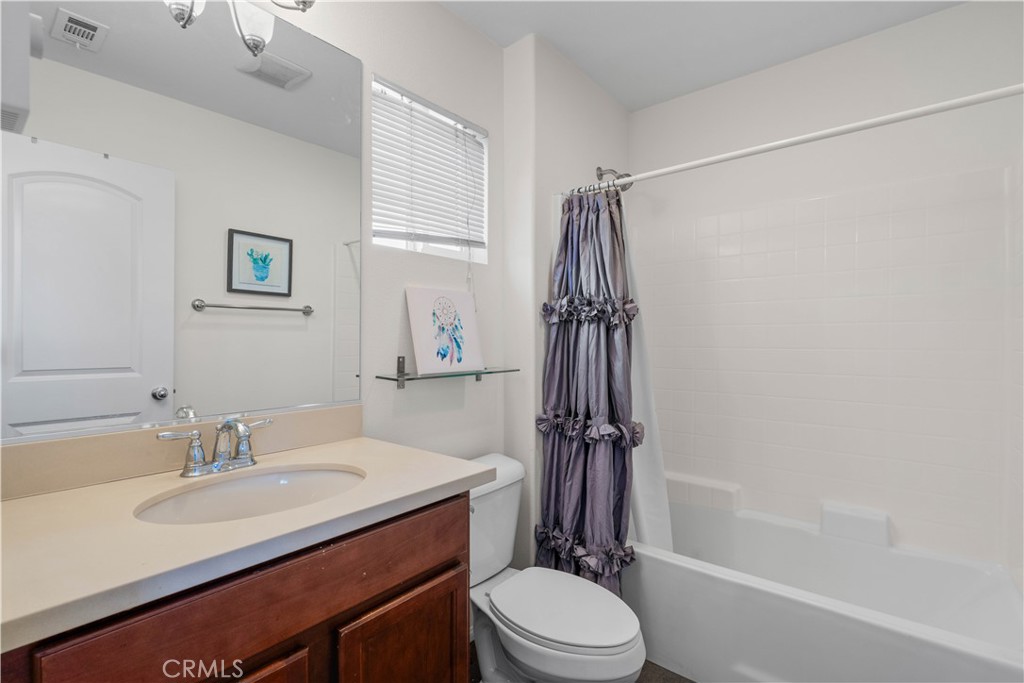 8039 City View Place Rancho Cucamonga, CA 91730 - Photo 26 of 39 a bathroom with a sink toilet and shower
