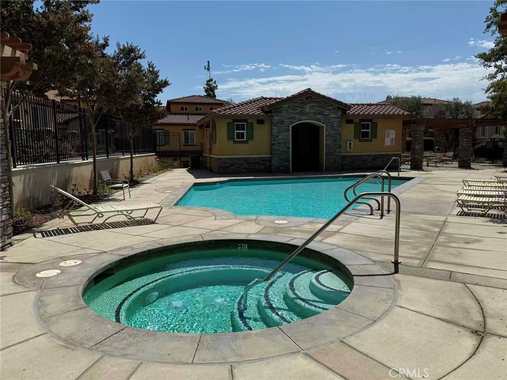 8039 City View Place Rancho Cucamonga, CA 91730 - Photo 35 of 39 a view of a swimming pool with a patio