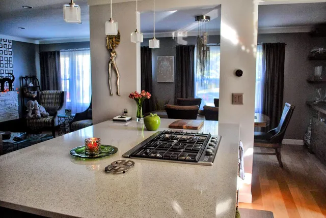 a kitchen with a table and chairs in it