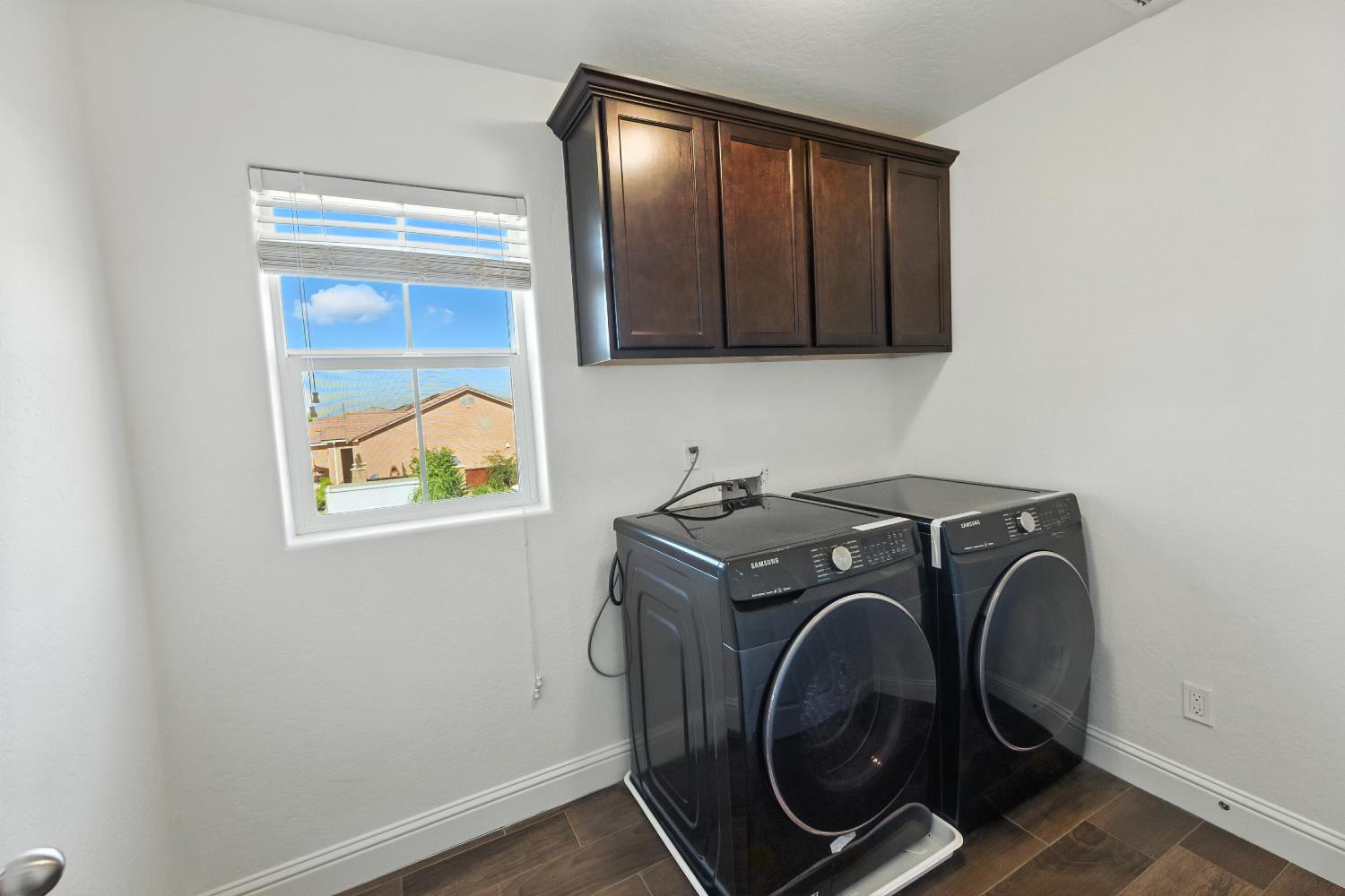 1732 Cleveland Street Selma, CA 93662 - Photo 18 of 24 a utility room with dryer and washer