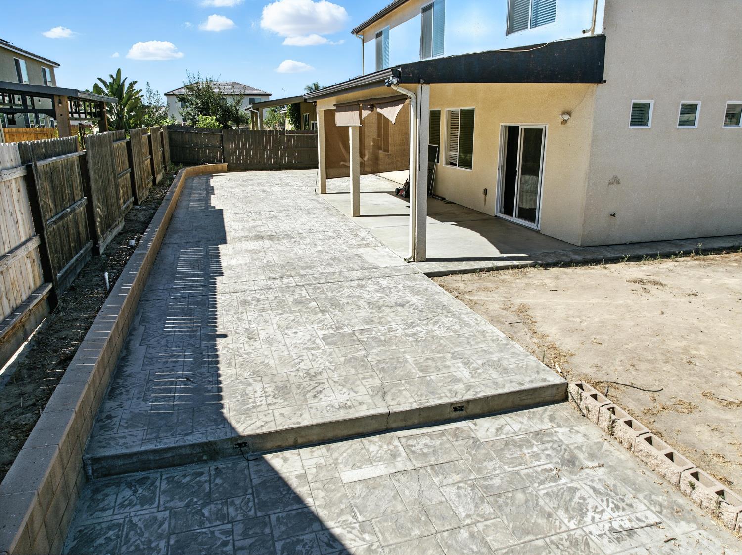 1732 Cleveland Street Selma, CA 93662 - Photo 20 of 24 a view of a house with a wooden fence