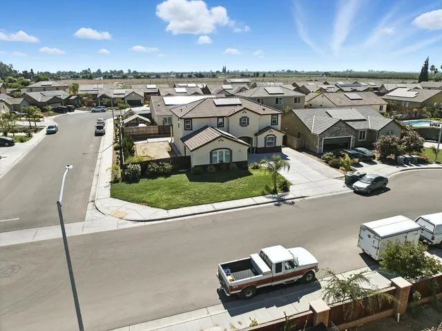 a view of a roof deck with furniture