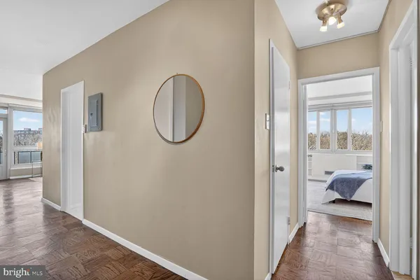a view of a bedroom from a hallway