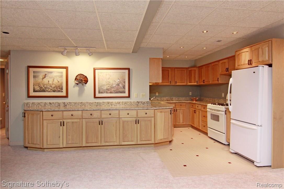 8400 Ridge Road Canton, MI 48187 - Photo 32 of 69 Entertain with Ease in this Granite Lower Level Kitchen