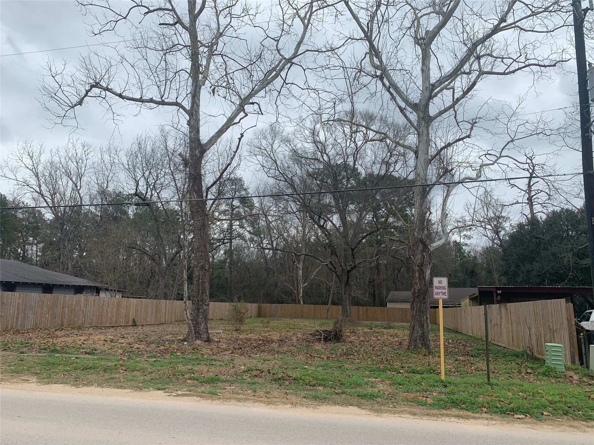 16871 Main Street Splendora, TX 77372 - Photo 3 of 4 a view of a backyard