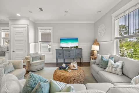 an aerial view of a house with a yard and garden