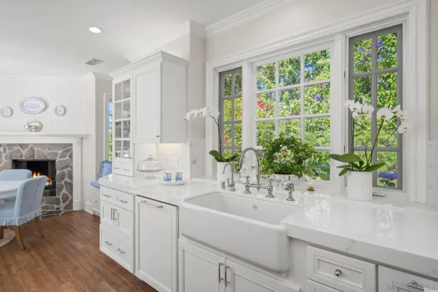 a bathroom with a sink and a large mirror