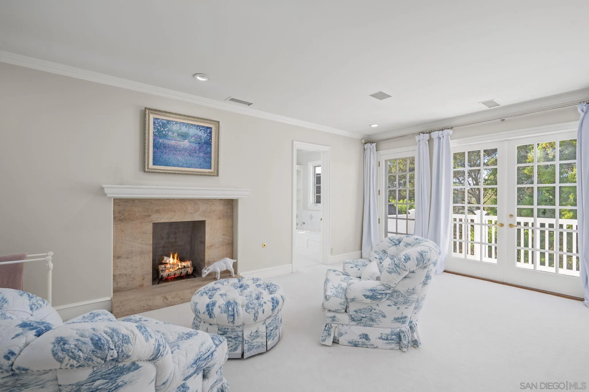 5618 Loma Verde Drive Rancho Santa Fe, CA 92067 - Photo 26 of 39 a bedroom with furniture and a fireplace