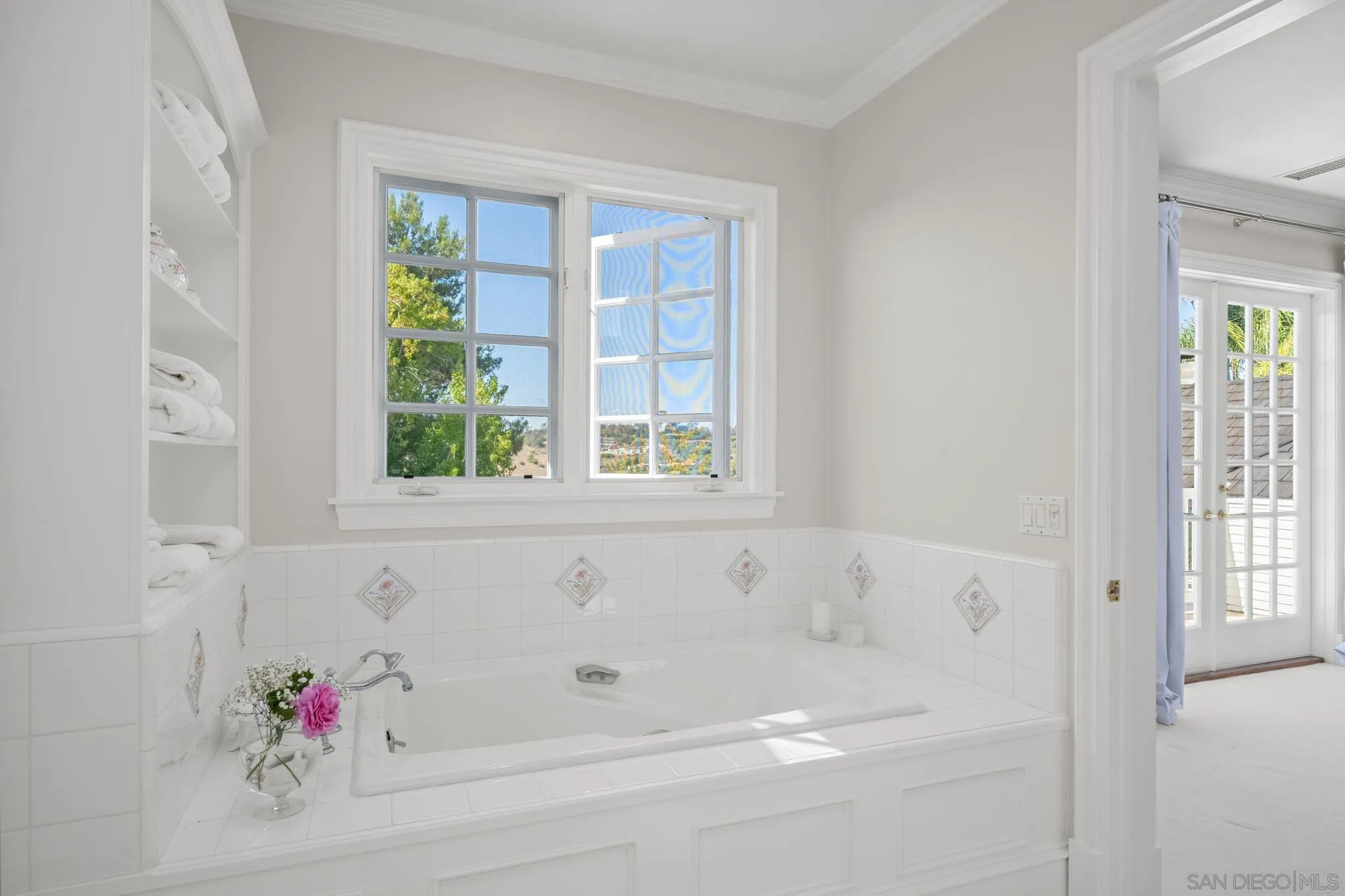 5618 Loma Verde Drive Rancho Santa Fe, CA 92067 - Photo 27 of 39 a white bath tub sitting next to a window