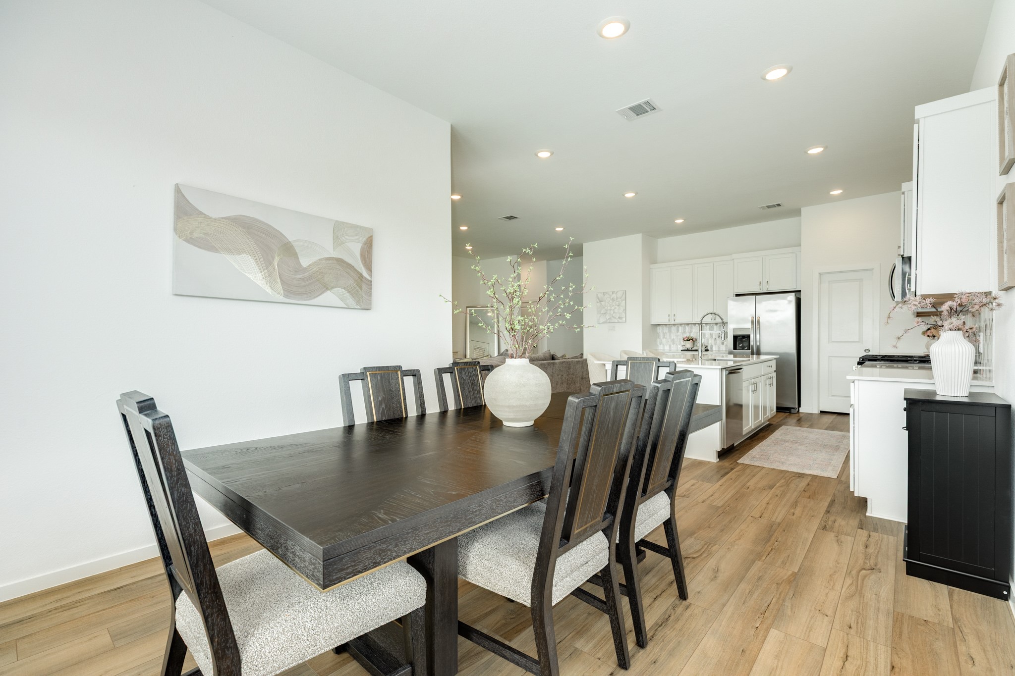2618 Jasper Oaks Drive Rosharon, TX 77583 - Photo 18 of 43 a view of a dining room with furniture and wooden floor
