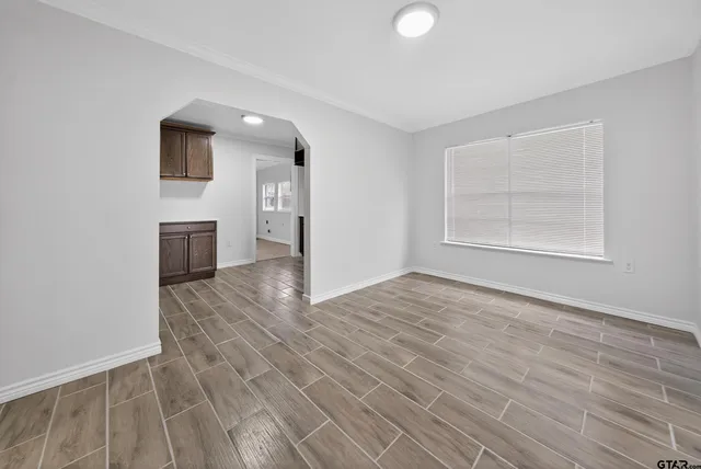 a house with trees in the background