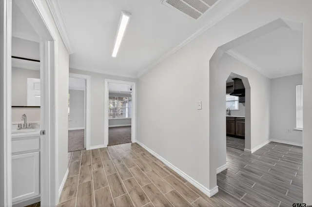 a kitchen with stainless steel appliances granite countertop a sink and cabinets