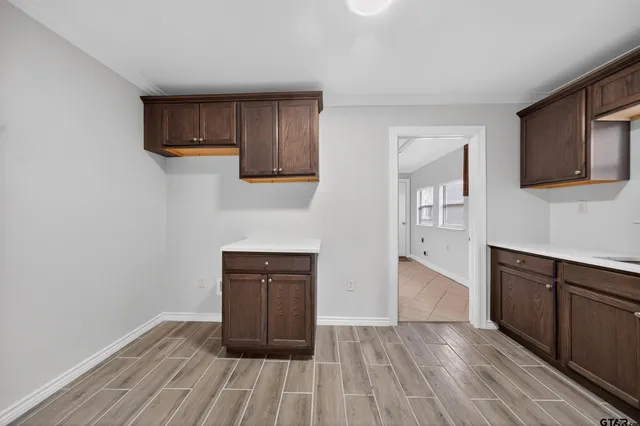 a bathroom with a toilet and a bathtub