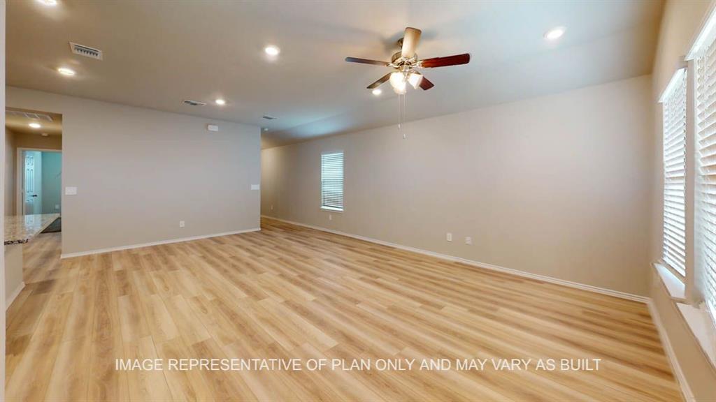 3201 Cyprian Road Lorena, TX 76655 - Photo 10 of 27 wooden floor in an empty room with a window