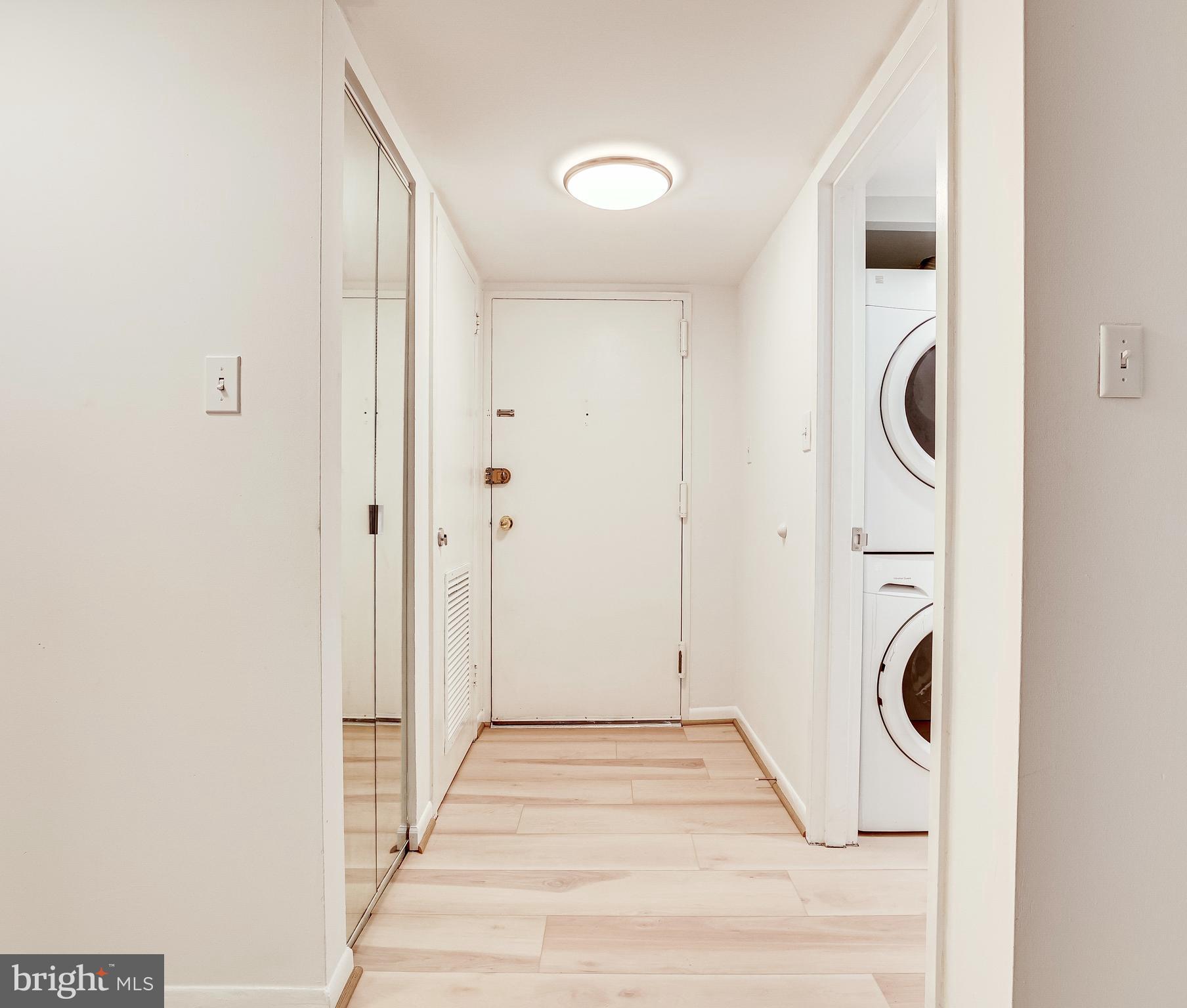 1556 Northgate Square, Unit 22B Reston, VA 20190 - Photo 3 of 34 Entrance with closet, new flooring and lighting