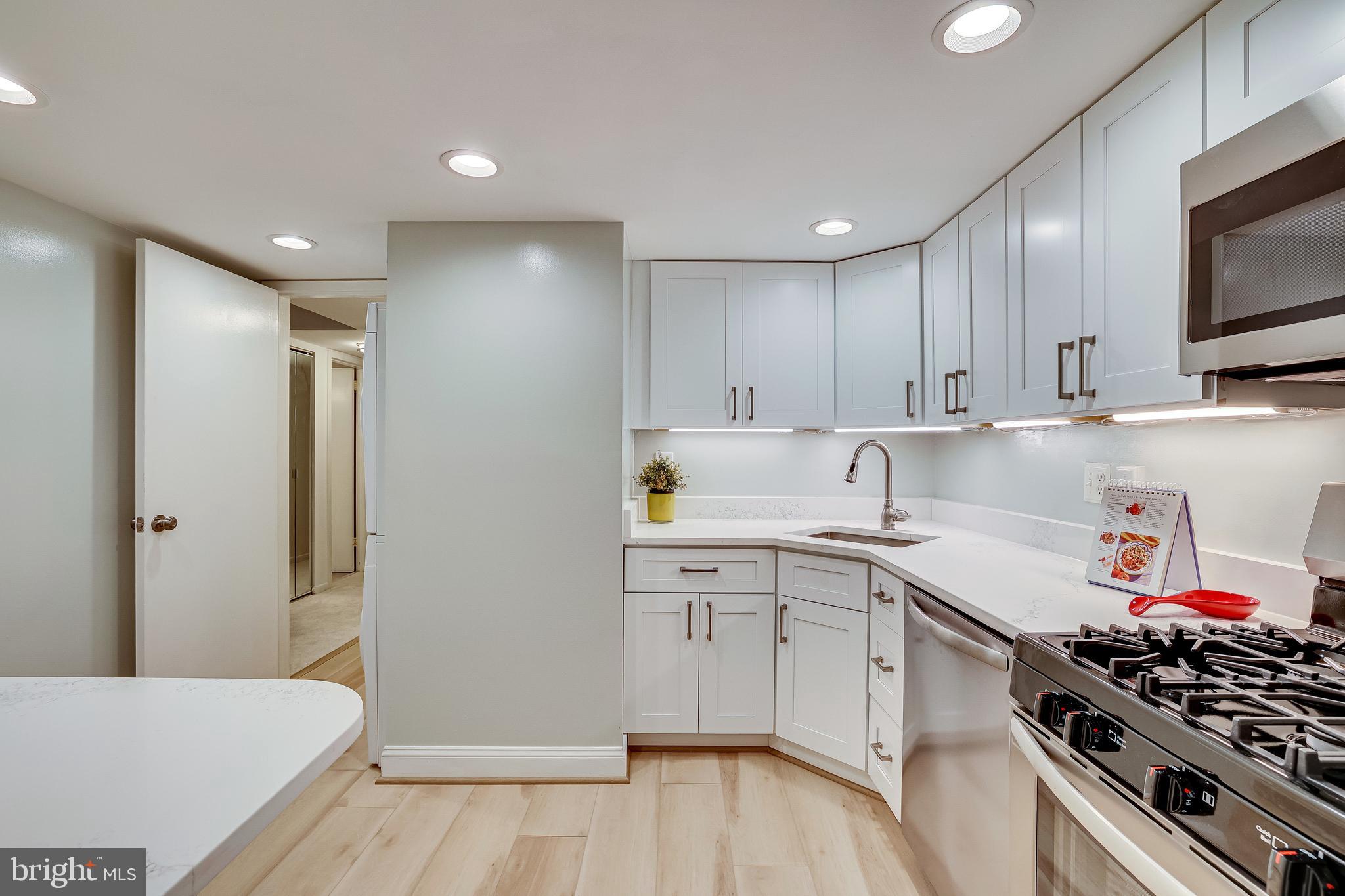 1556 Northgate Square, Unit 22B Reston, VA 20190 - Photo 7 of 34 New flooring, dimmable recessed LED lighting