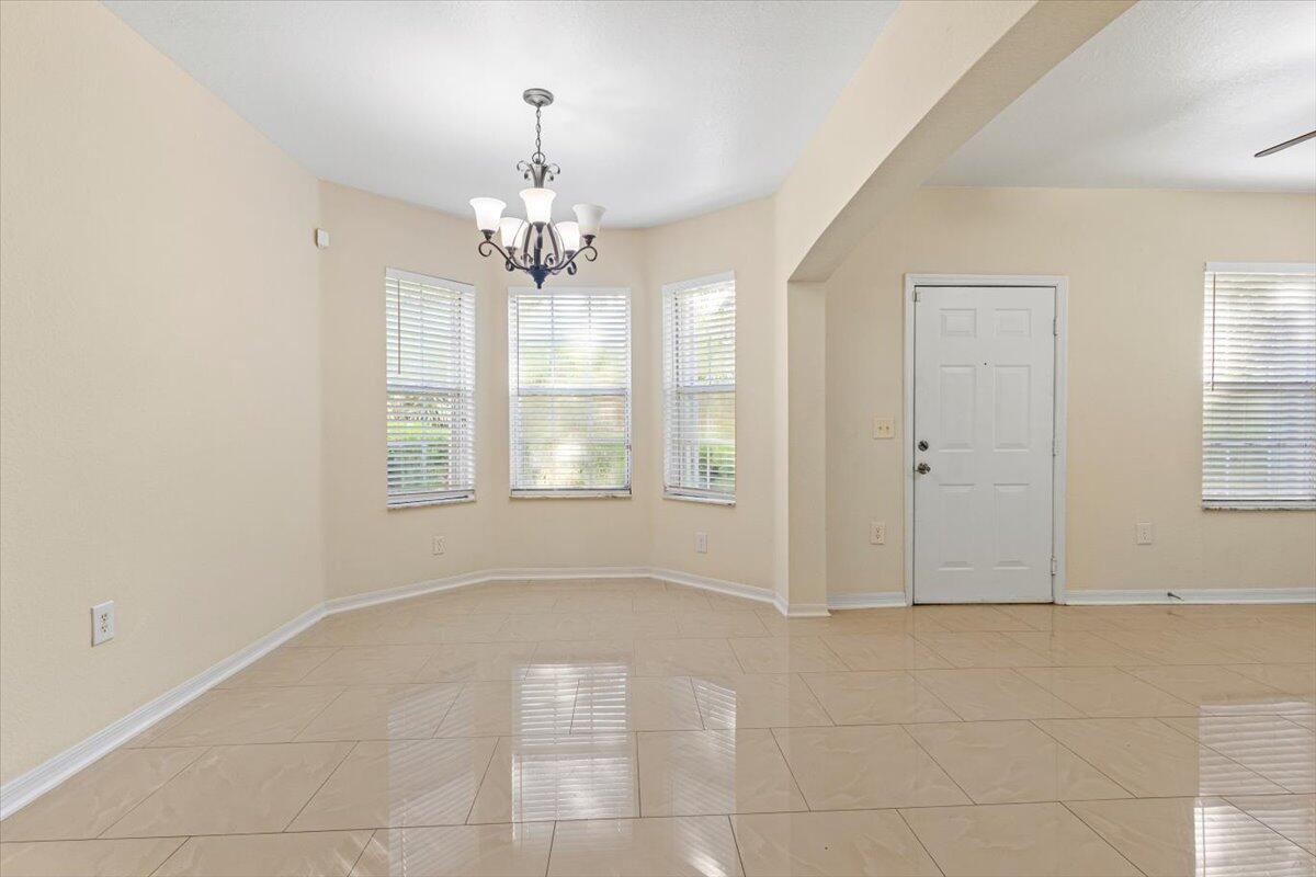 110 Southwest Peacock Boulevard, Unit 6101 Port St. Lucie, FL 34986 - Photo 15 of 70 a view of an empty room with a window