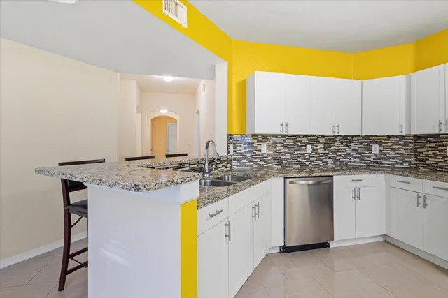 a view of a balcony with a floor to ceiling window and wooden fence