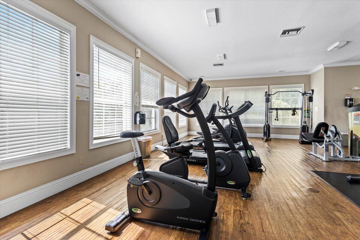 110 Southwest Peacock Boulevard, Unit 6101 Port St. Lucie, FL 34986 - Photo 50 of 70 a view of a room with gym equipment