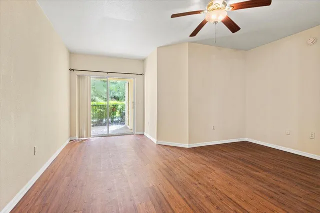 a car parked in front of a brick house