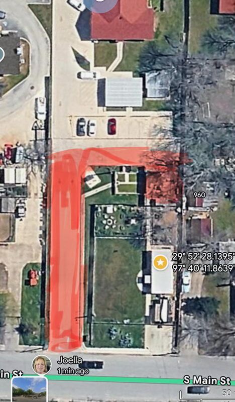 916 South Main Street Lockhart, TX 78644 - Photo 5 of 18 Visualize property boundaries and surrounding landscape with this detailed aerial view.