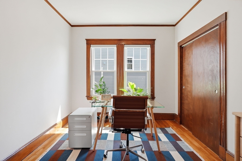 42 Lagrange Street, Unit U1 Boston, MA 02132 - Photo 23 of 42 a dining room with furniture and wooden floor