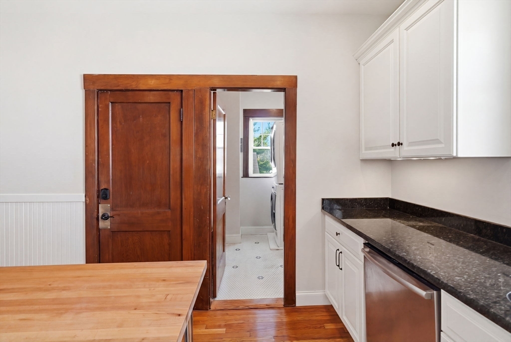 42 Lagrange Street, Unit U1 Boston, MA 02132 - Photo 24 of 42 a kitchen with granite countertop cabinets and sink