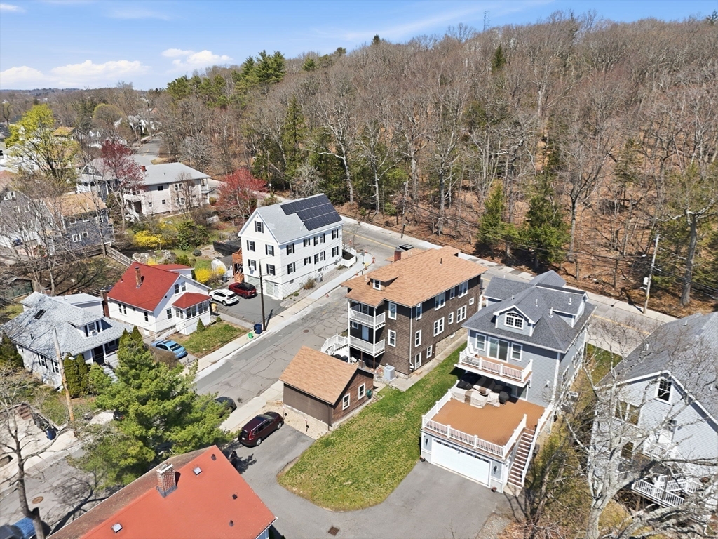 42 Lagrange Street, Unit U1 Boston, MA 02132 - Photo 31 of 42 an aerial view of residential house with outdoor space and trees all around