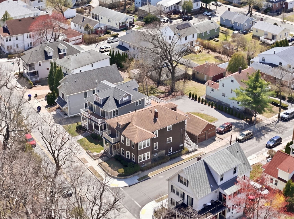 42 Lagrange Street, Unit U1 Boston, MA 02132 - Photo 36 of 42 an aerial view of a house with yard swimming pool and ocean view