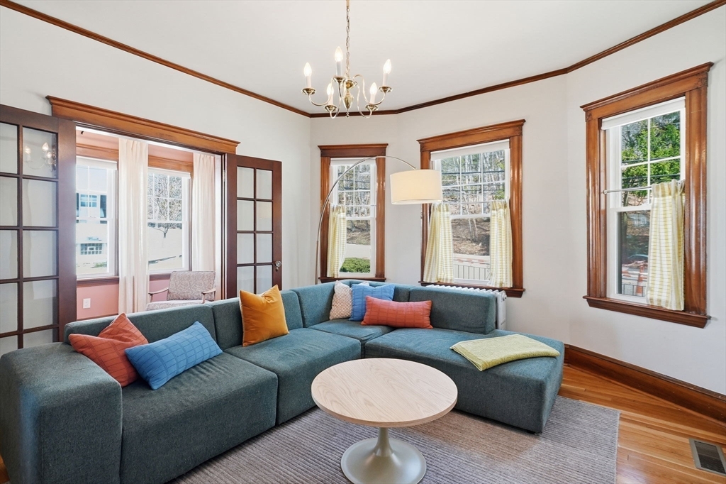 42 Lagrange Street, Unit U1 Boston, MA 02132 - Photo 6 of 42 a living room with furniture and a large window