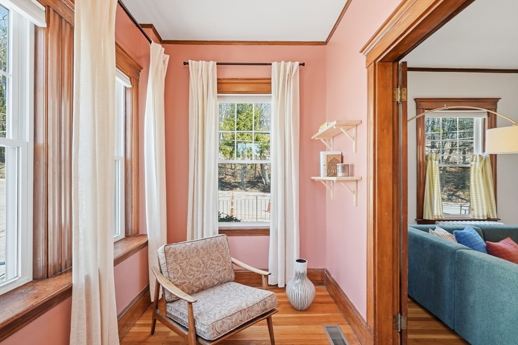 42 Lagrange Street, Unit U1 Boston, MA 02132 - Photo 7 of 42 a living room with furniture and a window