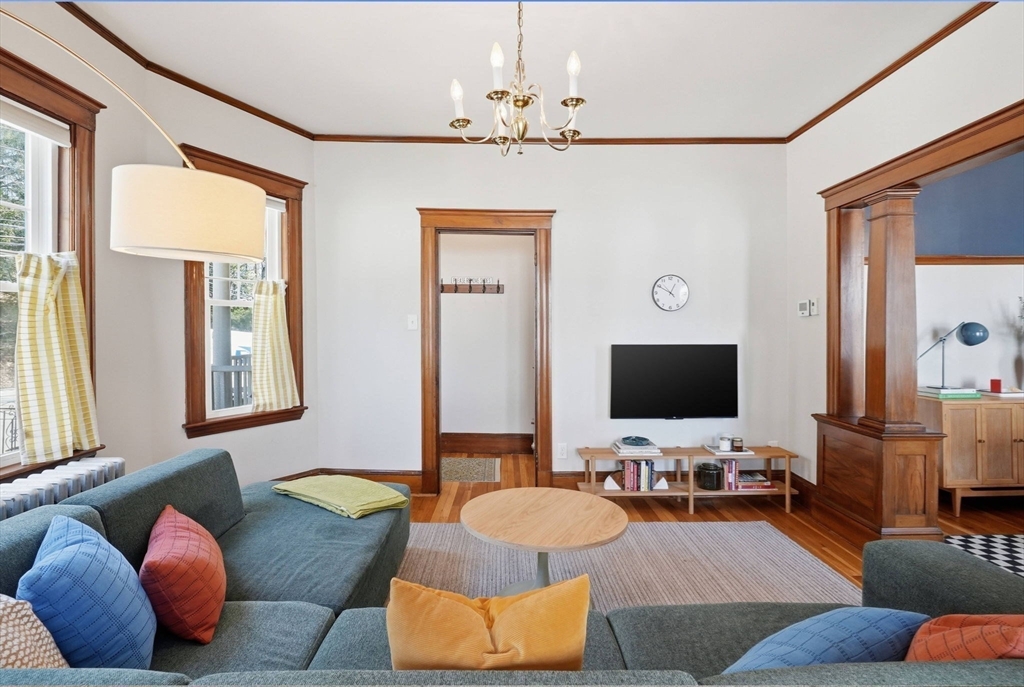 42 Lagrange Street, Unit U1 Boston, MA 02132 - Photo 10 of 42 a living room with furniture and a flat screen tv