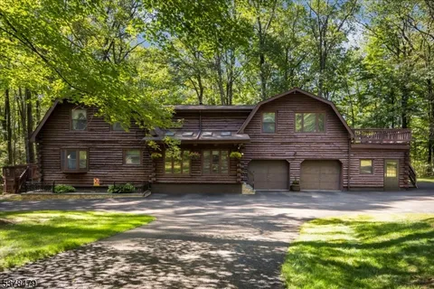 a view of a house with a small yard