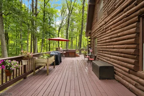 a view of a patio with wooden floor